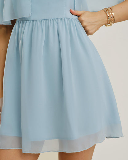 MINI VESTIDO AZUL DE GASA CON ESCOTE CORAZÓN